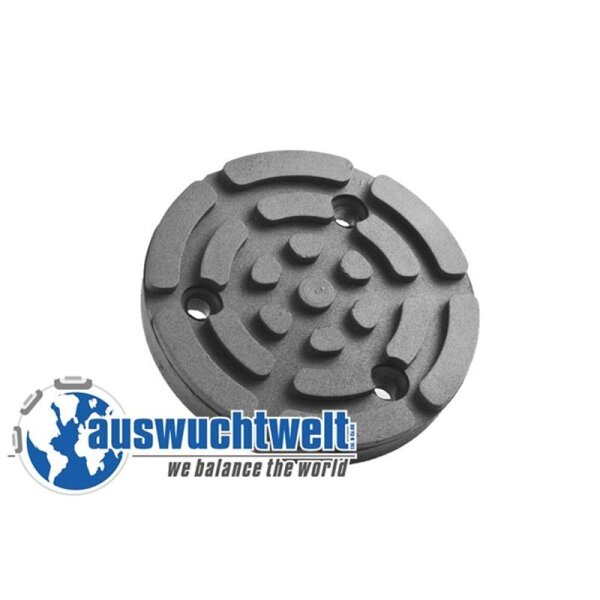 Das Bild zeigt ein rundes, graues, metallisches oder Gusseisen-Objekt mit drei gleichmäßig verteilten Bohrlöchern. Auf der Oberfläche sind mehrere erhabene, geschwungene Streifen und runde Vertiefungen in einem Muster angeordnet, die vermutlich zur Fixierung oder zum Ausgleich dienen. Unter dem Objekt ist ein Logo mit einem stilisierten Globus in Blau und Weiß zu sehen, daneben steht in blauer Schrift „auswuchtwelt“ und darunter in schwarzer Schrift „we balance the world“. Das Bild vermittelt den Eindruck, dass es sich um ein Bauteil für mechanische Auswuchtarbeiten handelt.