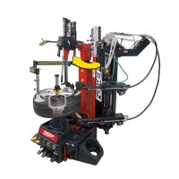Auf dem Bild ist eine Reifenmontiermaschine zu sehen, auf...