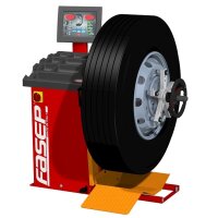 Das Bild zeigt eine rot-schwarze Auswuchtmaschine mit...