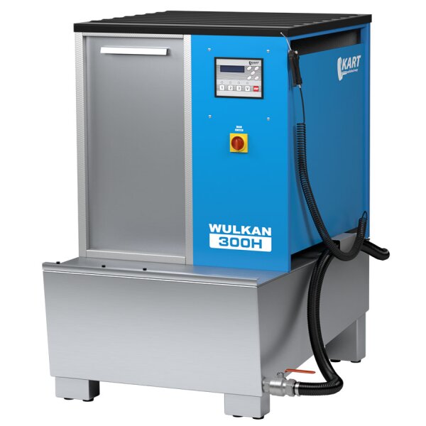 Das Bild zeigt eine rechteckige, industrielle Reinigungmaschine aus Metall mit blauer Front. Oben links befindet sich eine silberne Tür mit Griff, rechts daneben ein Bedienfeld mit Display und Tasten sowie ein großer, runder, gelber Not-Aus-Knopf darunter. Auf der Front steht „WULKAN 300H“. Rechts an der Maschine hängt ein schwarzer, spiralig gewickelter Schlauch. Oben rechts ist das Logo „KART“ zu sehen. Die Maschine steht auf vier kurzen Füßen, unten ist ein Auslaufventil mit Hebel angebracht.