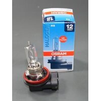 Das Bild zeigt eine Halogenlampe neben ihrer Verpackung....